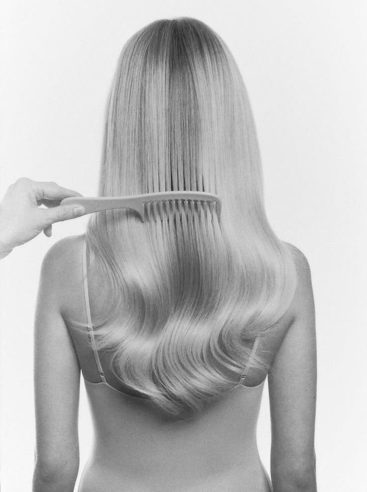 Editorial portrait of long combed hair